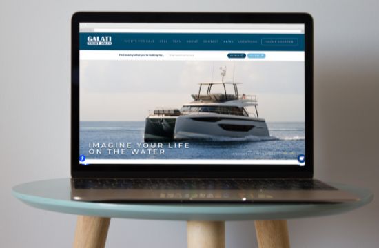 Laptop with Galati website showing