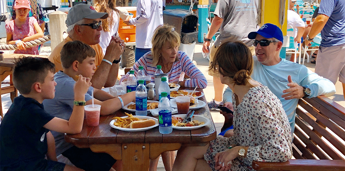 Family eating lunch at Viking Key West Challenge