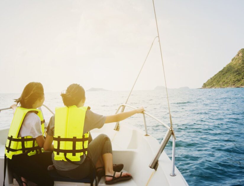 kids on a boat